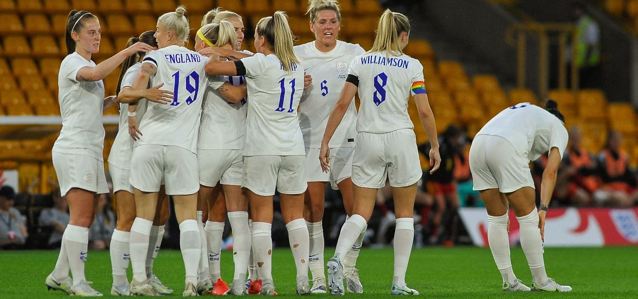 The English women's football team celebrates a goal in a warm-up game for the UEFA Euros 2022