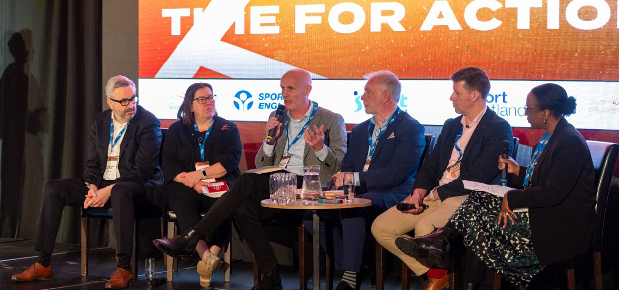 A group of panellists, including Sport England's CEO Tim Hollingsworth, discuss ideas during the Time for Action: Tackling Racism in Sport conference in March 2024