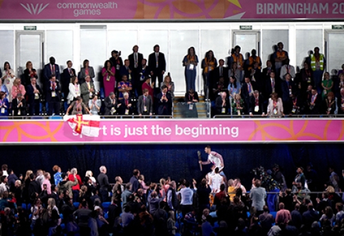 'Sport is just the beginning' is displayed on a board at the opening ceremony of the Birmingham 2022 Commonwealth Games as Max Whitlock delivers the Queen's Baton into the Alexander Stadium