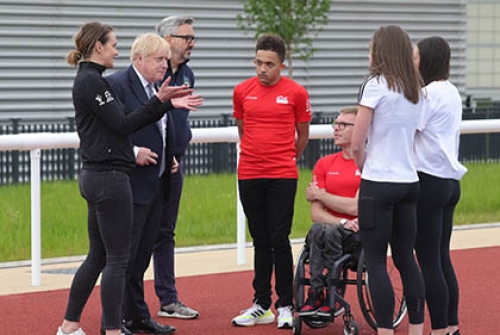 Former heptathlete Kelly Sotherton, Prime Minister Boris Johnson and Sport England Chief Executive speak to young athletes at the Alexander Stadium, at an occasion to mark Sport England's £6.5m investment into national governing bodies of sport ahead of the Birmingham 2022 Commonwealth Games