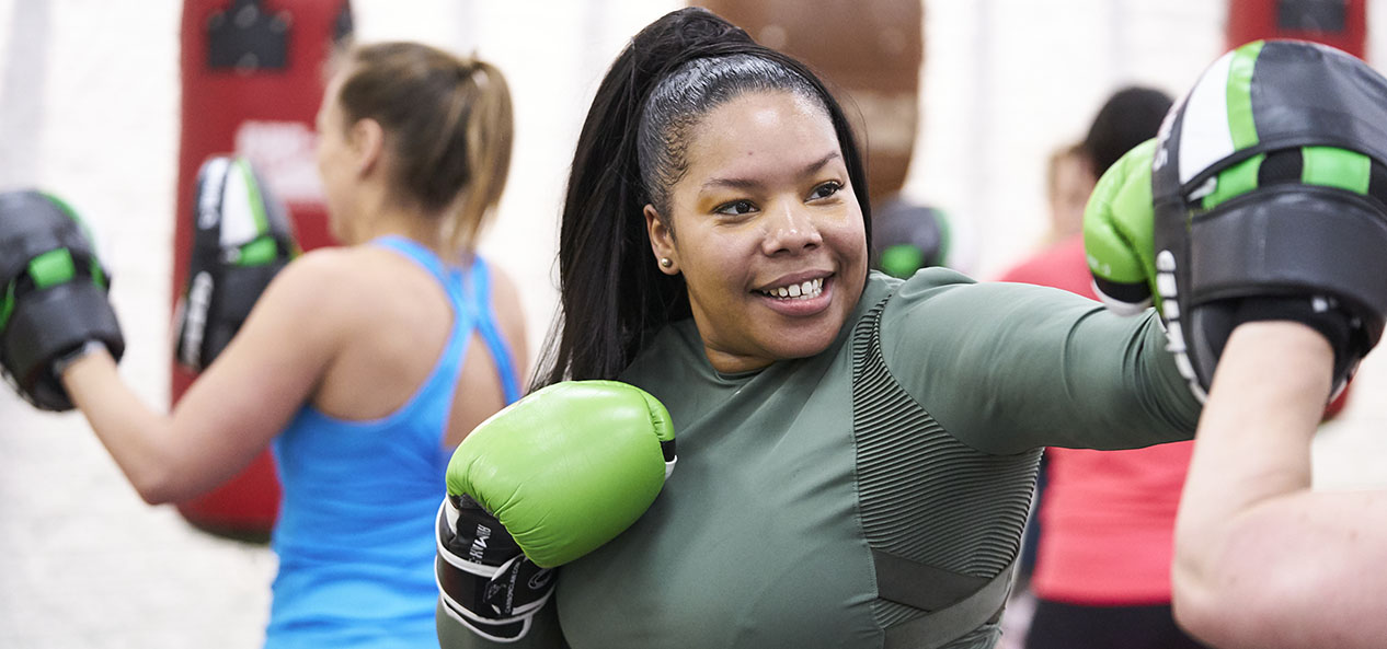 A women works out during a boxing session