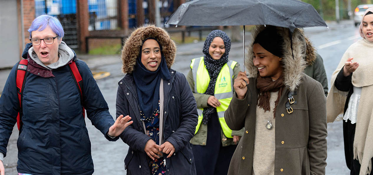 A group of women walking - part of the Diversity Matters North West project