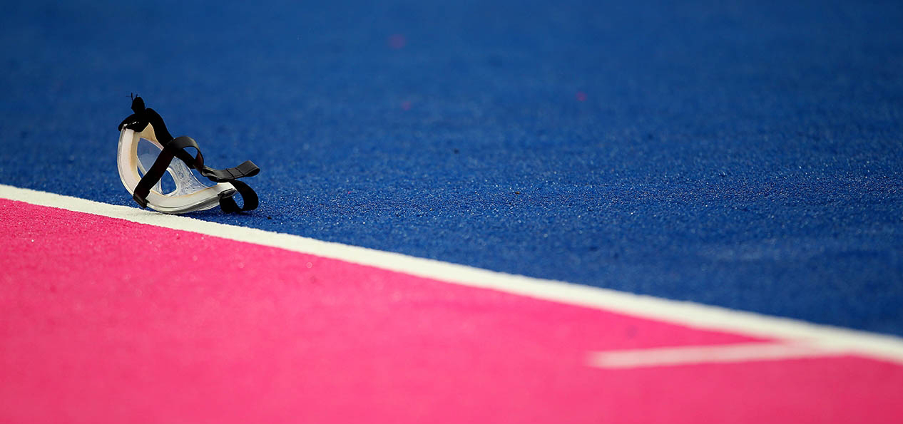 A mask on a hockey pitch