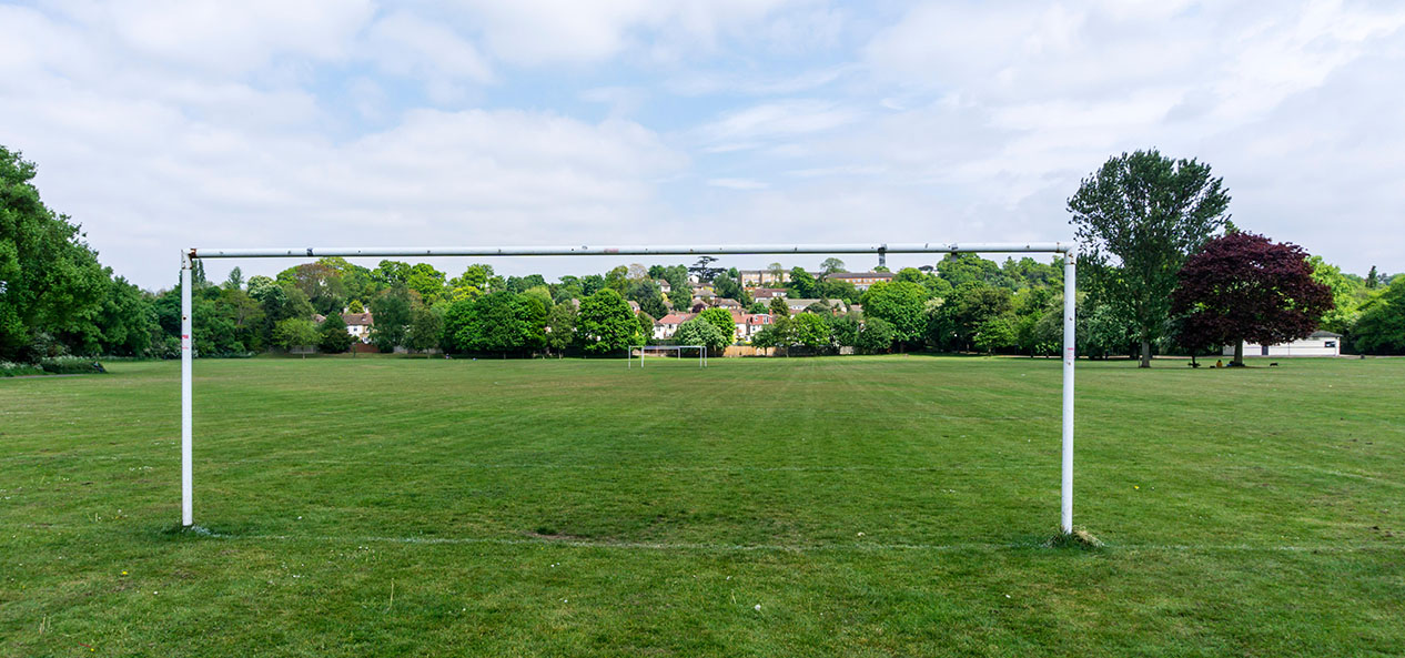 A general view of a playing field with a football goal