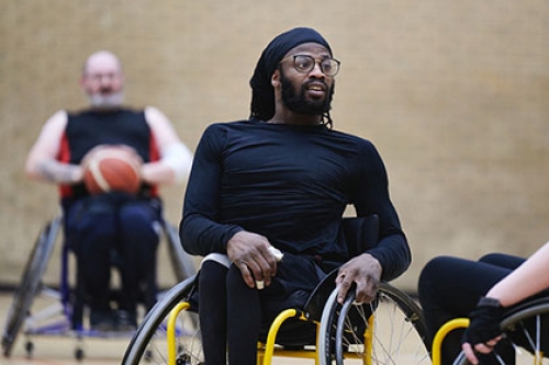 A wheelchair basketball player in action