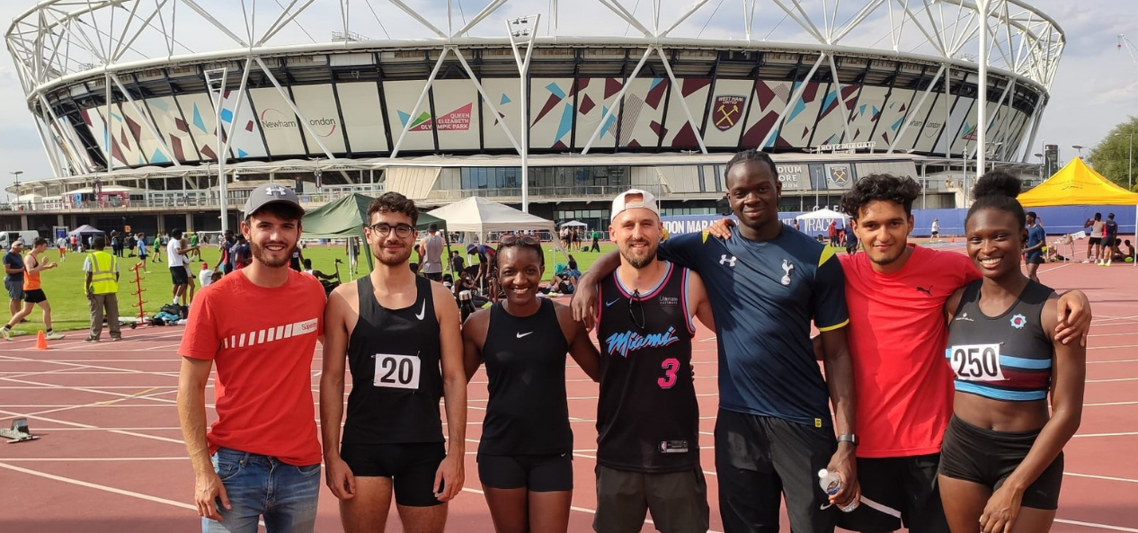 Shereen poses with her team and friends outside the stadium