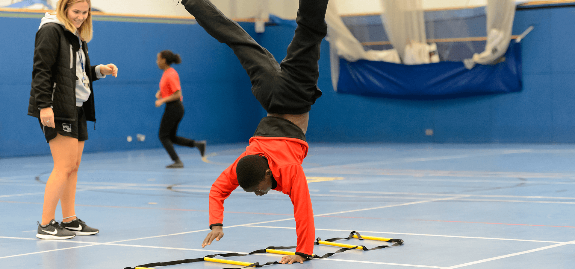 Walking handstand in the gym