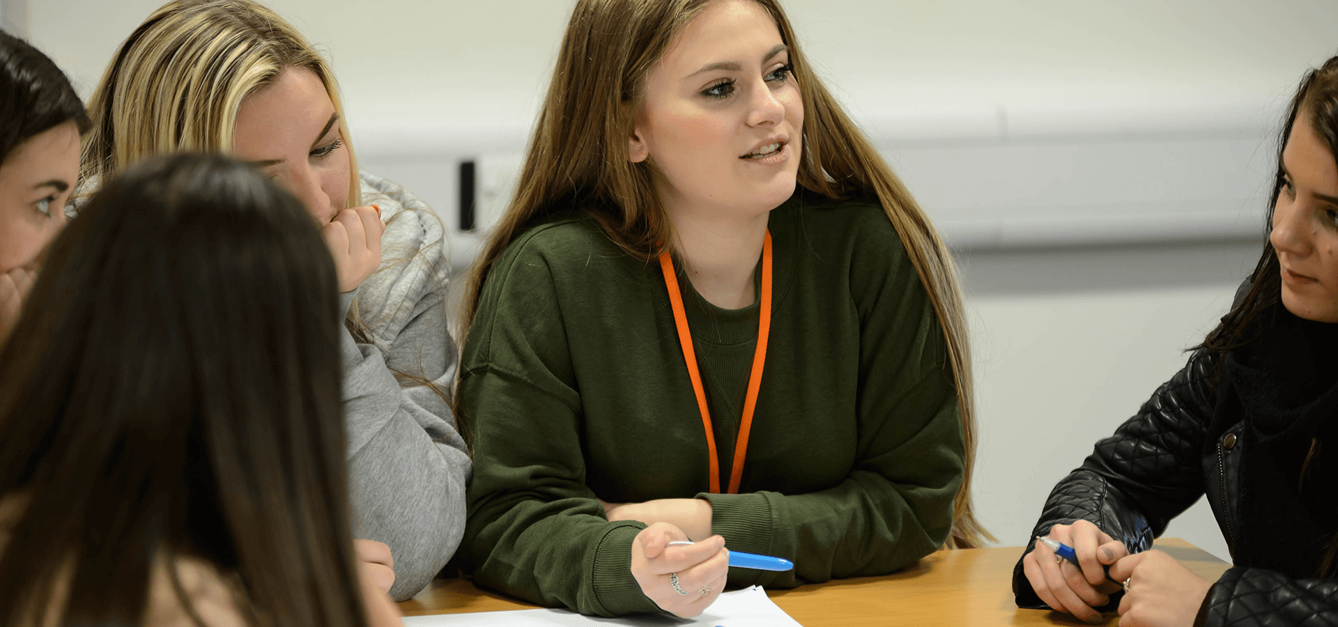 Young girls working on group project